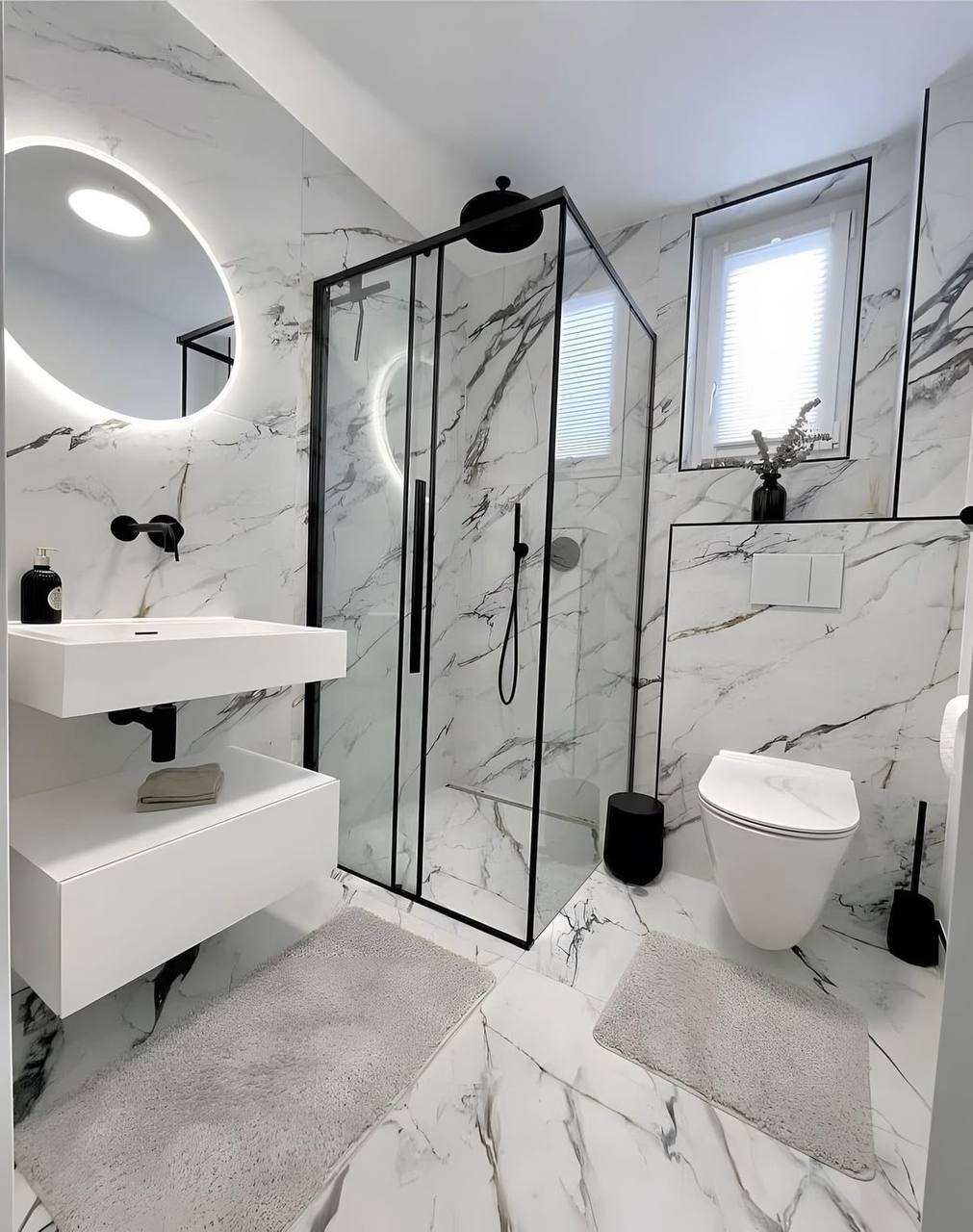 Full marble bathroom remodel with glass shower and floating vanity by ReDesignFix