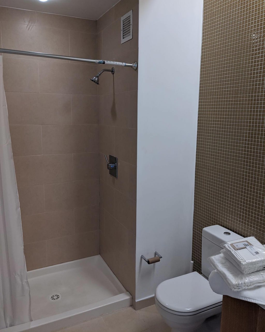 Navy double vanity with new wood-look flooring