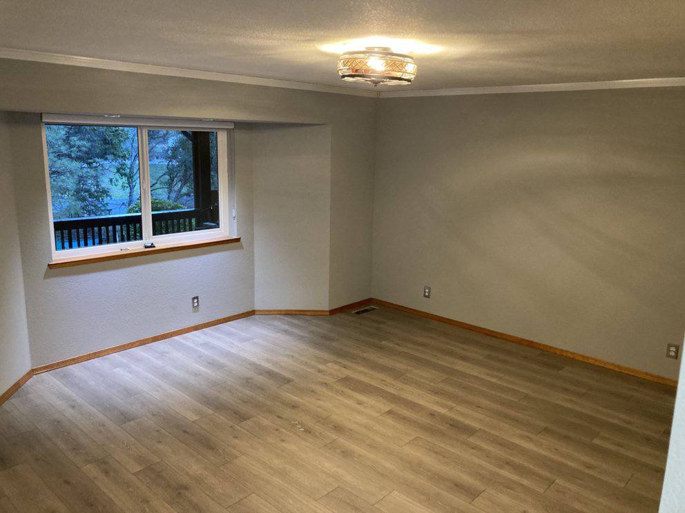 Bedroom with new wood-look flooring