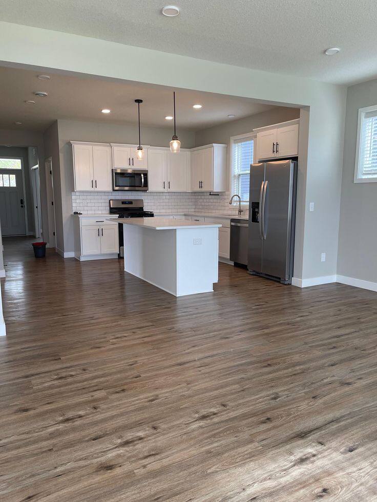 Kitchen with new water-resistant vinyl plank flooring