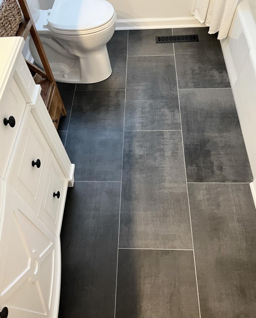 Large-format charcoal tile flooring